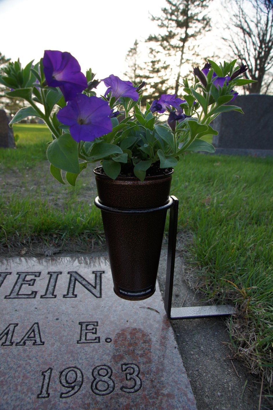 A loving memorial to those you love.
Monumate Memorial Flower Holders are a beautiful addition to your loved one’s memorial. The attractive antique copper or silver holder will enhance the beauty of any type of gravestone.